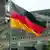 Флаг ФРГ на фоне Рейхстага