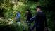 A group of Afghan teenagers walk in the woods toward France A group of Afghan teenagers walk in the woods toward France