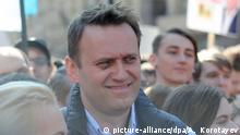 Kremlin-friendly tycoon Usmanov attacks Navalny in court and online
