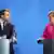 Президент Франции Эмманюэль Макрон и канцлер Германии Ангела Меркель