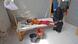 A child lying on a hospital bed A child lying on a hospital bed