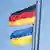 Flagi niemiecka i ukraińska