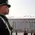 Китайский полицейский на площади Тяньаньмэнь