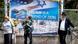 Israelis walks past a poster welcoming and supporting US President Donald Trump in downtown Jerusalem Israelis walks past a poster welcoming and supporting US President Donald Trump in downtown Jerusalem