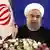 Iranian President Hassan Rouhani speaks during a press conference in Tehran