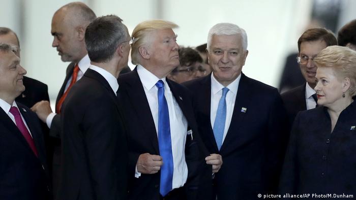 US President Donald Trump pushes Montenegro premier Dusko Markovic