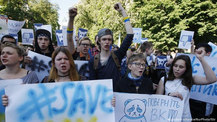 Young Ukrainians protesting a ban on Russian social media platforms and web services