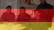 Transparent German flag superimposed on Iraqi refugees Transparent German flag superimposed on Iraqi refugees