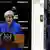 London Theresa May Rede Downing Street in London
