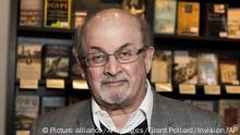 Author Salman Rushdie poses for photographers at a signing for his new book 'Home', in London, Tuesday, June 6, 2017. (Photo by Grant Pollard/Invision/AP) |