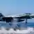 Um avião militar americano do tipo F/A-18E Super Hornet, similar ao que abateu a aeronave síria