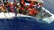 A boat with African refugees being saved in Libyan waters A boat with African refugees being saved in Libyan waters