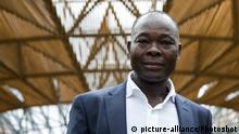 London, UK. 20 June 2017. Diebedo Francis Kere (pictured), the award-winning architect from Gando, Burkina Faso, has designed the Serpentine Pavilion 2017, next to the Serpentine Gallery in Kensington Gardens. Kere leads the Berlin-based practice Kere Architecture. He is the 17th architect to accept the Serpentine Gallery's invitation to design a temporary Pavilion in its grounds. The Pavilion is open to the public from 23 June to 8 October 2017. |