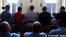 21.06.2017+++ Defendants stand in the court room, ahead of the trial in which they are charged with causing the death of 71 migrants who suffocated in a lorry found beside an Austrian motorway in 2015, in Kecskemet, Hungary June 21, 2017. REUTERS/Bernadett Szabo