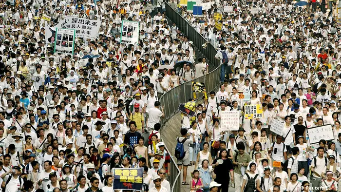 2004: Rally for democracy
China's policy of one country, two systems has often created tension. In 2004, on the seventh anniversary of the handover, hundreds of thousands of people protested in Hong Kong, demanding political reform. They were calling for democracy and direct elections for Hong Kong's next leader.