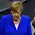 Almanya Başbakanı Angela Merkel ve koltuğunu kaybeden Volker Kauder
