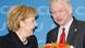 Kancelarja Angela Merkel, përgëzon kryeministrin e Hesenit Roland Koch, 19 janar 2009. Kancelarja Angela Merkel, përgëzon kryeministrin e Hesenit Roland Koch, 19 janar 2009.