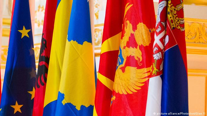 West Balkan flas aside an EU flag