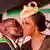 Robert Mugabe kissing his wife on the cheek at his 93. birthday celebration