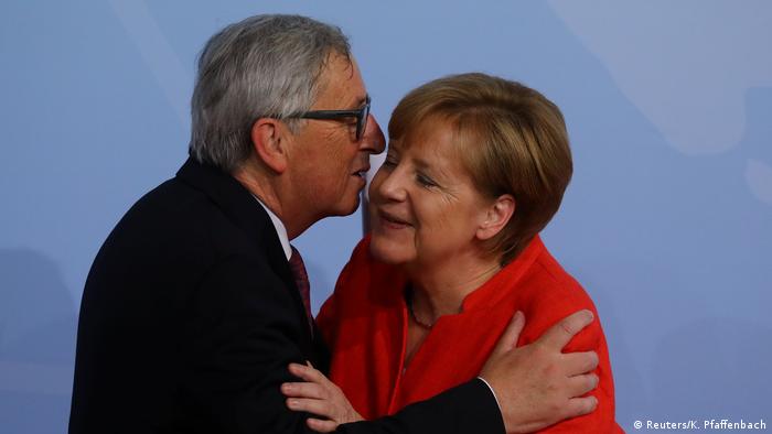 Juncker y Merkel.