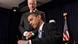 Barack Obama signing a document Barack Obama signing a document