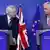 UK Secretary of State for Exiting the European Union David Davis (L) and the European Commission's Chief Brexit Negotiator Michel Barnier talk to reporters at the start of a first full round of talks on Britain's divorce terms from the European Union, in Brussels