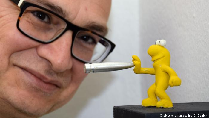 Tan Cemal Genç and his yellow figure