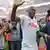 An emotional shot of Cologne striker Anthony Modeste, after May 12's Bundesliga game against Mainz. Cologne, its fans and Modeste celebrated qualifying for the Europa League after the game. Professional photographer Jörg Schüler is also in the shot, stood at Modeste's right shoulder.