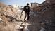 A rebel fighter in a Damascus suburb A rebel fighter in a Damascus suburb