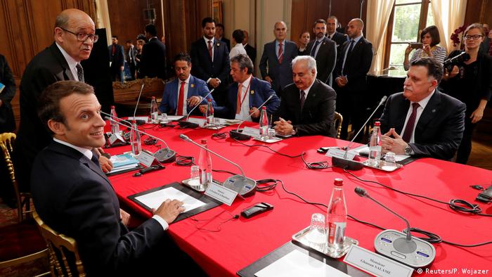 French President Emmanuel Macron, Libyan National Army General Khalifa Haftar and Prime Minister Fayez al-Sarraj