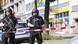 Police in Hamburg patrol outside of an Edeka supermarket where a stabbing took place Police in Hamburg patrol outside of an Edeka supermarket where a stabbing took place