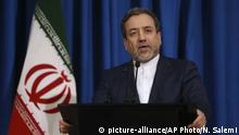 Iran's Deputy Foreign Minister Abbas Araghchi, who is also a senior nuclear negotiator, speaks with media in a press conference in Tehran, Iran, Sunday, Jan. 15, 2017. Iran says the nuclear deal between the Islamic Republic and world powers “will not be renegotiated” ahead of U.S. President-elect Donald Trump taking office this week. (AP Photo/Vahid Salemi) |