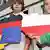 Zum Besuch des polnischen Premierministers Donald Tusk im September 2008 halten zwei Schüler zwei Tafeln in Form der Länder Deutschland (l) und Polen in Händen. Sie symbolisieren die gemeinsame Zukunft beider Länder in der EU. (Foto:dpa)