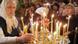 Russian Tamara Smirnova places a candle during a Christmas service in the Christ the Savior Cathedral in Moscow Russian Tamara Smirnova places a candle during a Christmas service in the Christ the Savior Cathedral in Moscow