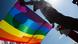 Activists hold up a rainbow flag against the sun at an LGBT Pride march in Saint Petersburg Activists hold up a rainbow flag against the sun at an LGBT Pride march in Saint Petersburg