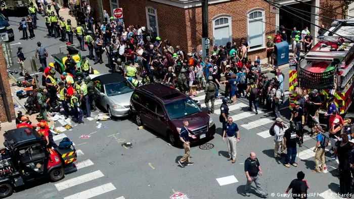 People receive first-aid after a car rammed into counter-protesters at a rally in Charlottesville, Virginia (Getty Images/AFP/P.J. Richards)