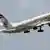 Etihad Airways Boeing 777-3FX plane takes off