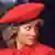 Lady Diana wearing a red hat