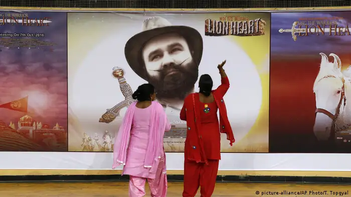 In recent years, Ram Rahim turned his attention to Bollywood by directing, producing and even starring in his own films. Titles such as Messenger from God and The Warrior – Lionheart naturally reflect his larger-than-life persona. The guru has also released a number of music albums, with his 2014 song Love Charger becoming a big hit.