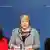 Michelle Bachelet (c.), do Chile: última mulher de pé