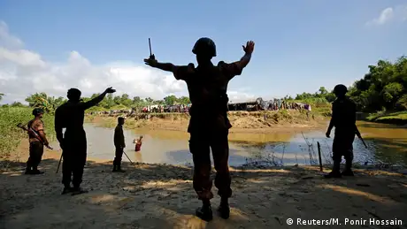 Bangladesh's border guards block the Rohingyas from crossing in