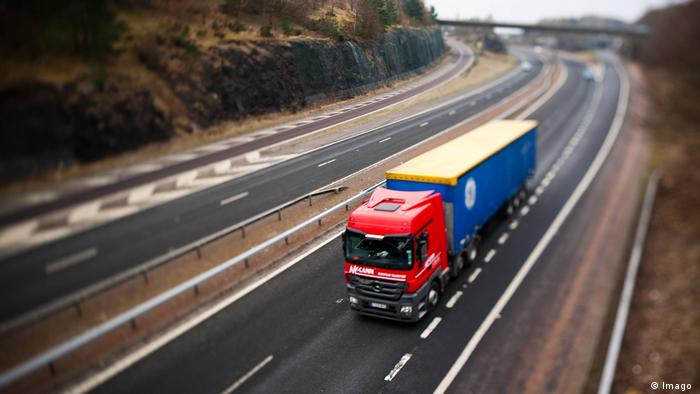 A photo of a a truck on a motorway