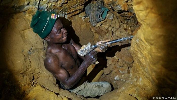 miner drilling in a mine shaft (Robert Carrubba)