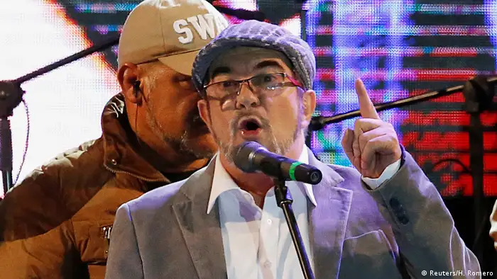 FARC leader Rodrigo Londono, known by his nom de guerre Timochenko, speaks during the launching of the new polÄÄitical party called the Revolutionary Alternative Common Force, at the Plaza de Bolivar in Bogota (Reuters/H. Romero)