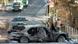 Deutschland - Polizeibeamte stehen am Wrack der Herrhausen-Limousine in Bad Homburg 1989 Deutschland - Polizeibeamte stehen am Wrack der Herrhausen-Limousine in Bad Homburg 1989