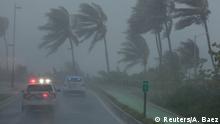 Police patrol the area as Hurricane Irma slams across islands in the northern Caribbean on Wednesday, in San Juan, Puerto Rico September 6, 2017. REUTERS/Alvin Baez