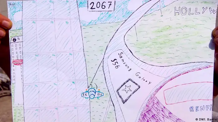 Kids4Climate Kind zeichnet futuristische Landschaft (DW/I. Banos)