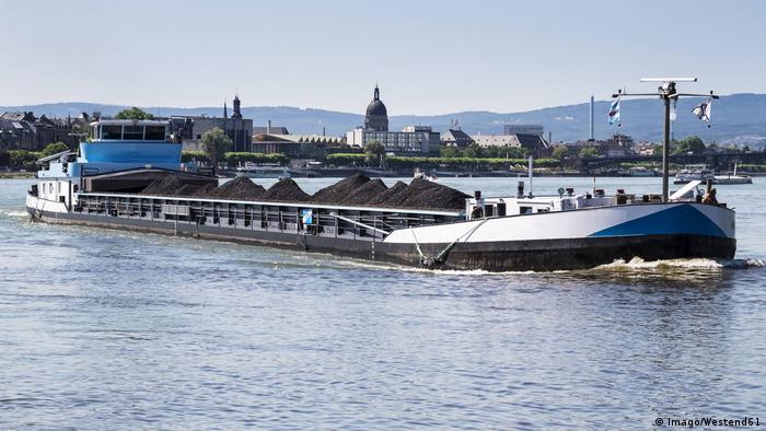 A cargo ship carrying coal on the Rhine River