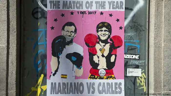 Wandplakat mit marioanRajoy und Carles Puigdemont 