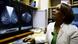 Sudanese radiologist Dr Hania Fad looks at digital images of a breast scan Sudanese radiologist Dr Hania Fad looks at digital images of a breast scan